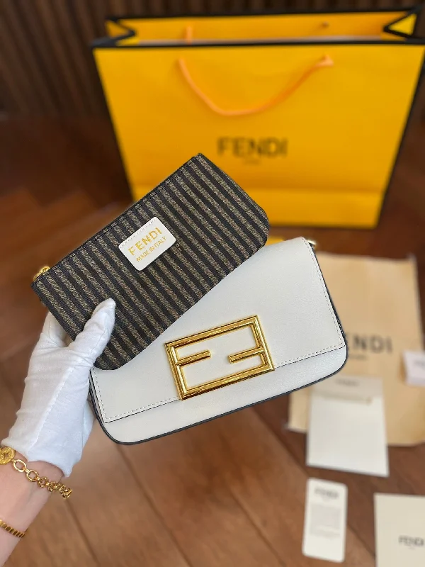 Fendi handbags with a metallic - finish FF logo for a bold and glamorous lookEN   Designer bags by Fendi 250