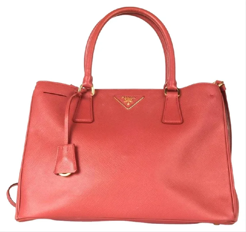 Prada Cleo bags with a contrast - colored interior for visual interestPrada Saffiano Tote Red Leahter Shoulder Bag