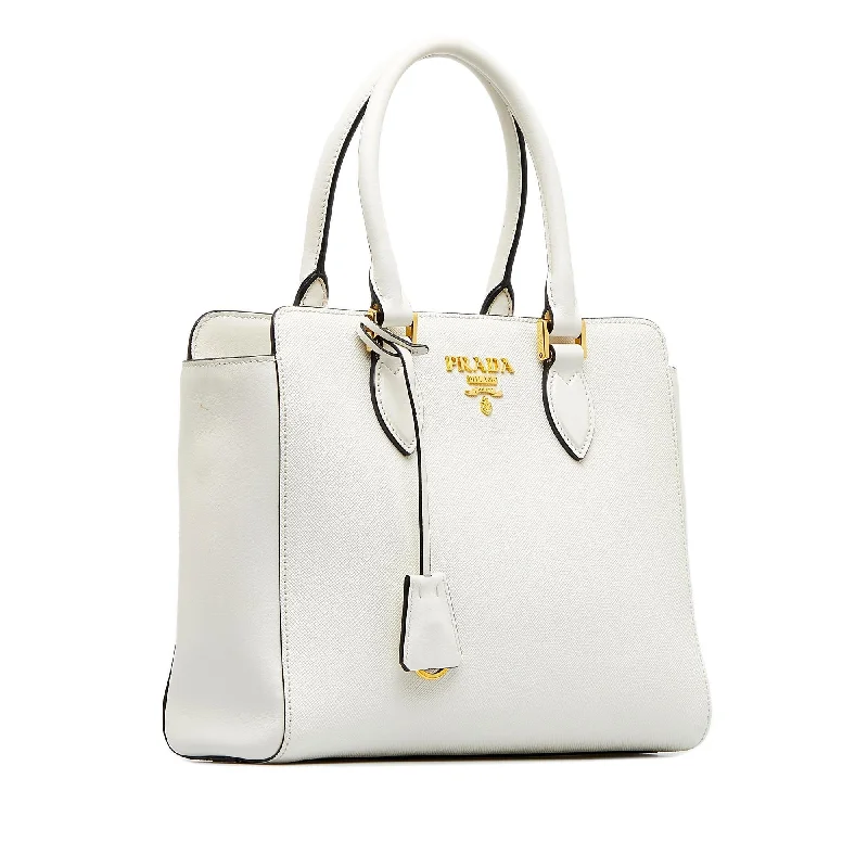 Ladies Prada Re - Edizione 2005 bags in a pastel color for a soft lookPrada Saffiano and Soft Calf Satchel (SHG-WmkMwI)