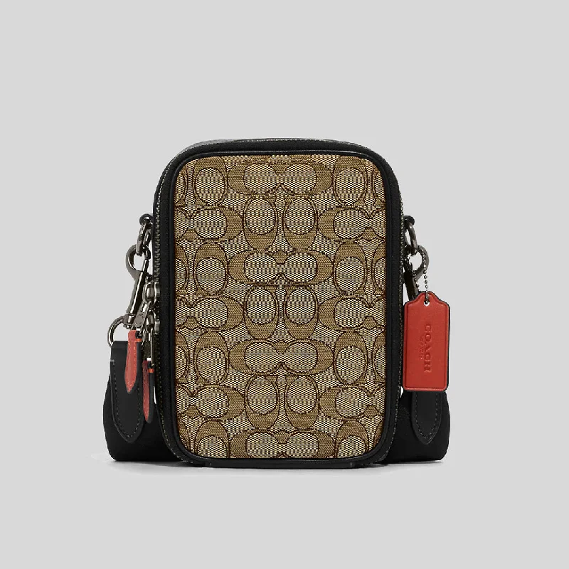 Coach tote bags with a printed Coach logo for brand visibilityCOACH Stanton Crossbody In Signature Jacquard Khaki/Black Multi CH097