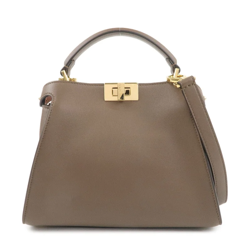 Medium - sized Fendi shoulder bags in rich, deep colors like burgundy for a sophisticated appearanceFENDI Leather Peekaboo Iconic Essentially 2Way Bag Brown 8BN302