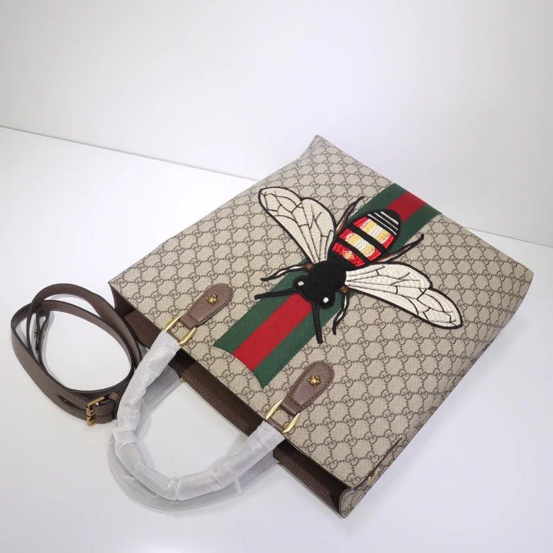 Women Gucci bags with a chain - link trim and a leather bodyWomen Gucci bags with a chain - link trim and a leather bodyGucci Bags