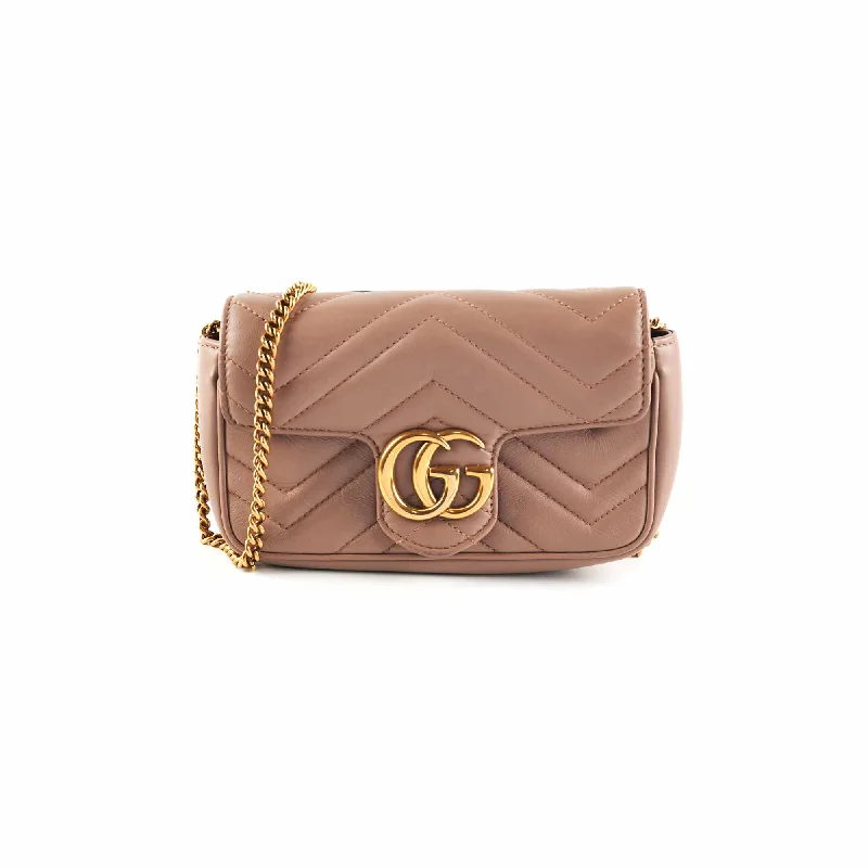 Ladies Gucci shoulder bags with a wide - width strapLadies Gucci shoulder bags with a wide - width strapGucci GG Supermini Marmont Matelasse Dusty Pink