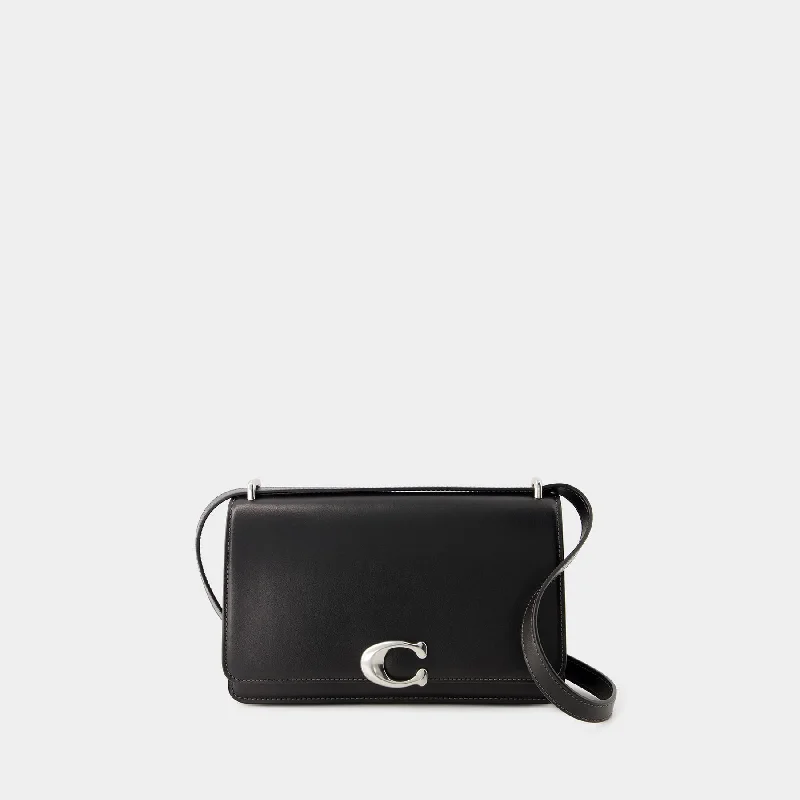 Coach bags with a zippered interior pocket for separating itemsBandit Bag - Coach - Leather - Black