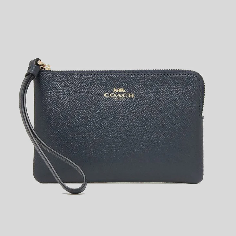 Ladies Coach Tabby bags with gold - toned hardware for a touch of luxuryCoach Corner Zip Wristlet Midnight 58032