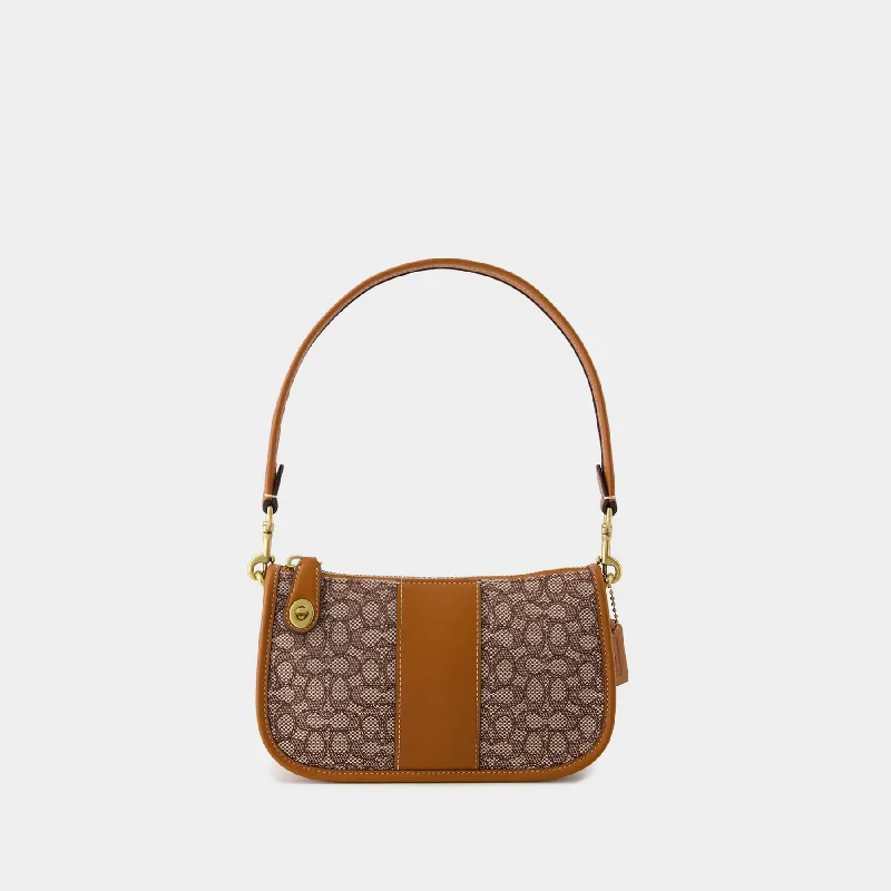 Coach Rogue bags featuring the signature C - hardware for a branded lookSwinger 20 Hobo Bag - Coach - Leather - Cocoa