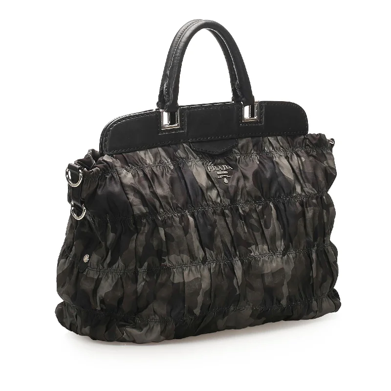 Prada Cleo bags with a contrast - colored interior for visual interestPrada Camouflage Gaufre Tessuto Tote Bag 22711