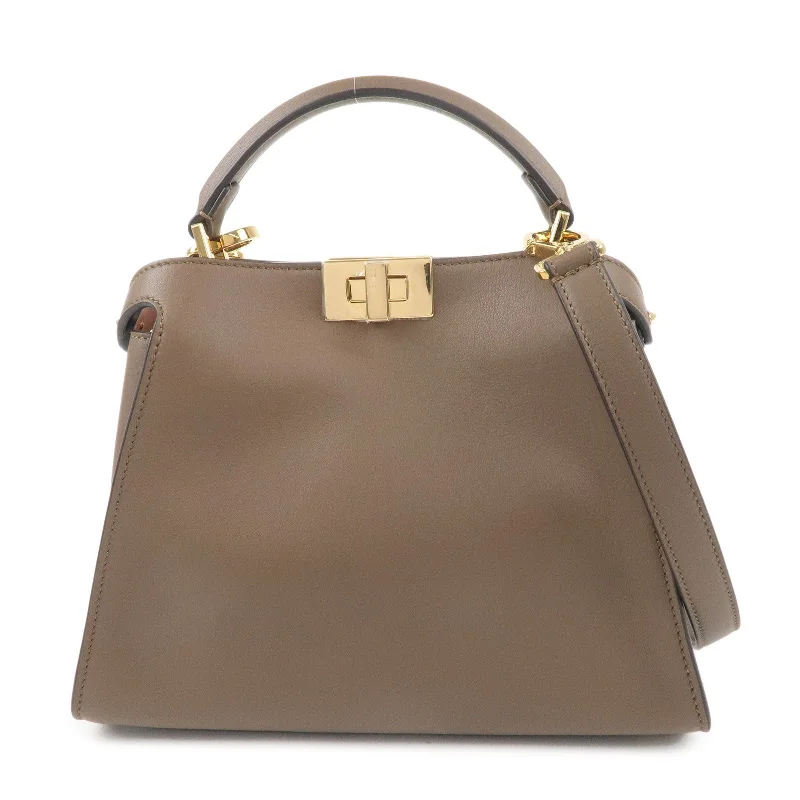 Ladies Fendi Peekaboo bags with gold - toned hardware for a touch of luxuryFENDI Leather Peekaboo Iconic Essentially 2Way Bag Brown 8BN302