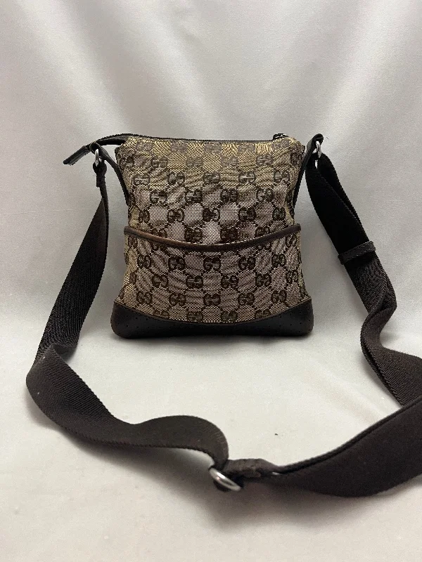 Women Gucci bags with a snap - button closure and a decorative charmWomen Gucci bags with a snap - button closure and a decorative charmGucci Crossbody