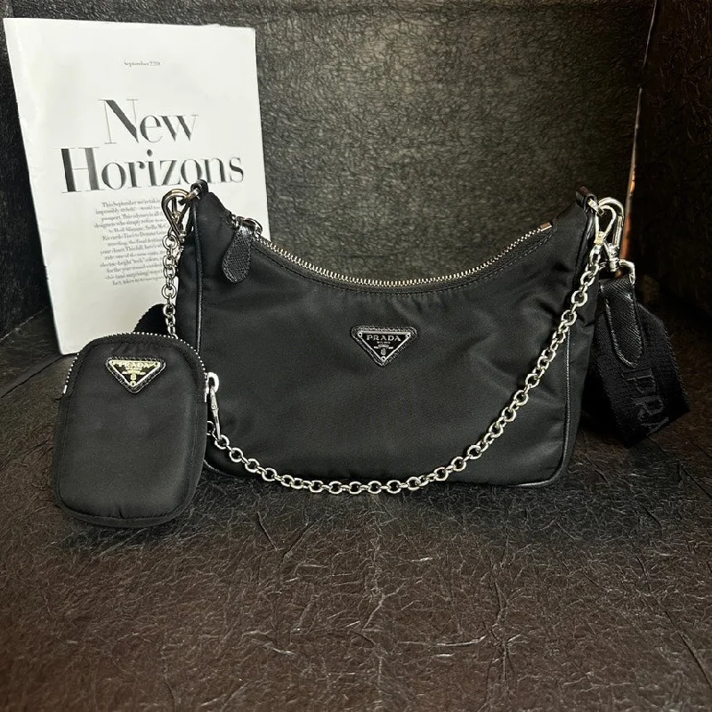 Ladies Prada handbags with a detachable wallet inside for added conveniencePrada Re-Edition 2005 Black Nylon Three-In-One Bag 21cm