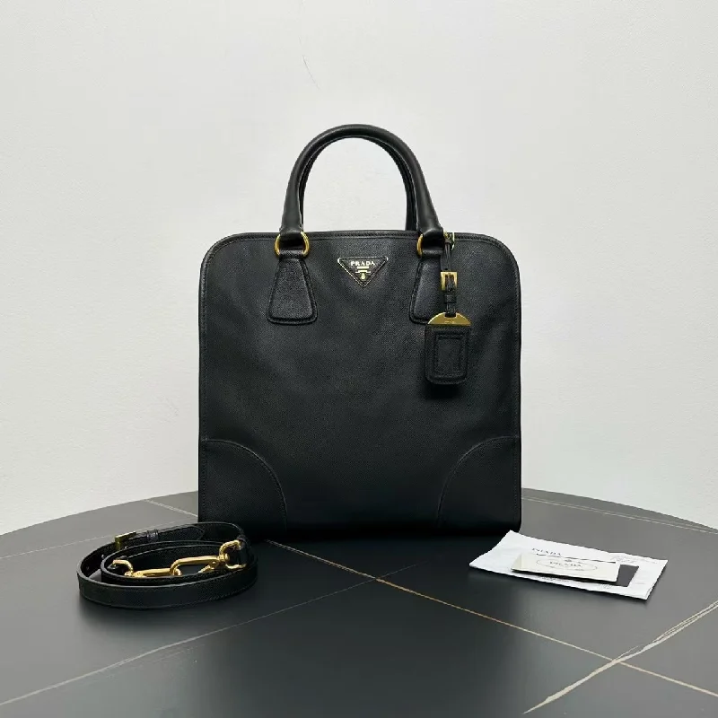 Prada bags with a snap - button closure and a decorative charm for a fashionable lookPrada Black Leather Tote Bag Medium Size