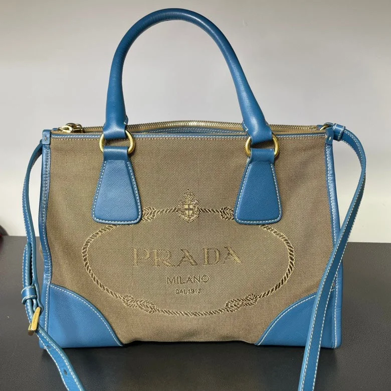 Prada bags with a front - zip pocket for small items like cards and keysPrada Canapa Blue Beige Canvas Leather Logo Tote Bag Medium