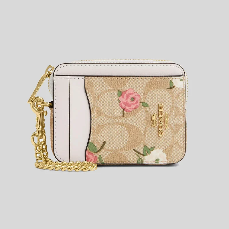 Ladies Coach Tabby bags with a detachable shoulder strapCOACH Zip Card Case In Signature Canvas With Floral Print CR971