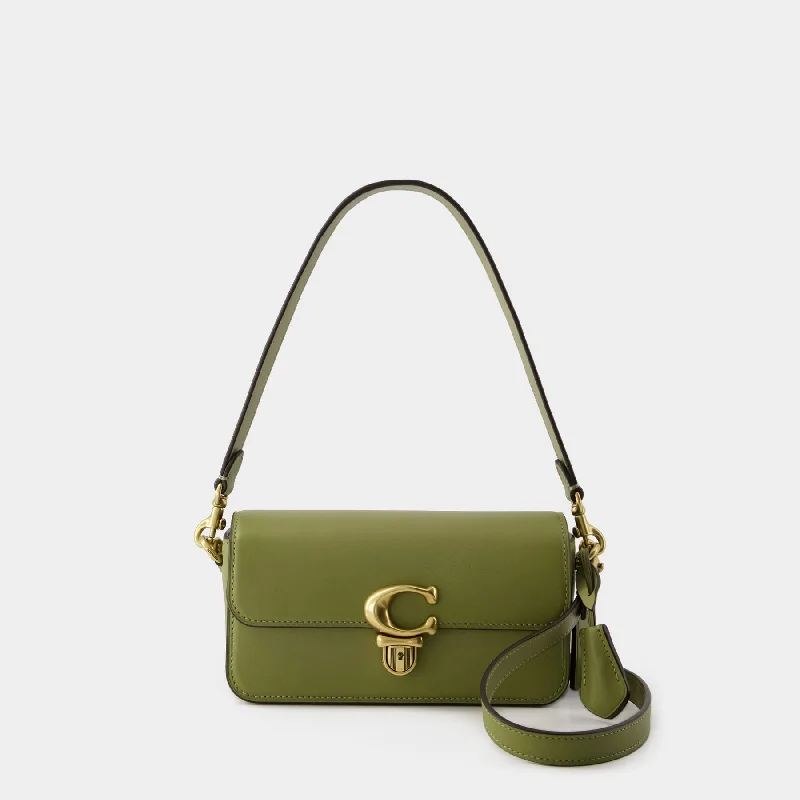 Coach bags with a back - zip pocket for storing valuables securelyHobo Studio Baguette - Coach - Leather - Khaki