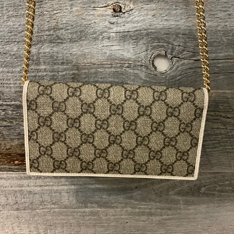 Women Gucci Sylvie bags with a detachable ribbon detailWomen Gucci Sylvie bags with a detachable ribbon detailGucci 1955 Horsebit Wallet with Chain