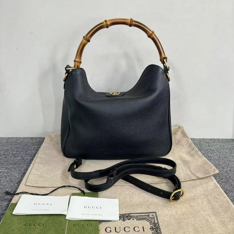 Women Gucci bags with a chain - link trim and a leather bodyWomen Gucci bags with a chain - link trim and a leather bodyGucci Bamboo Black Leather HandBag Medium with DustBag