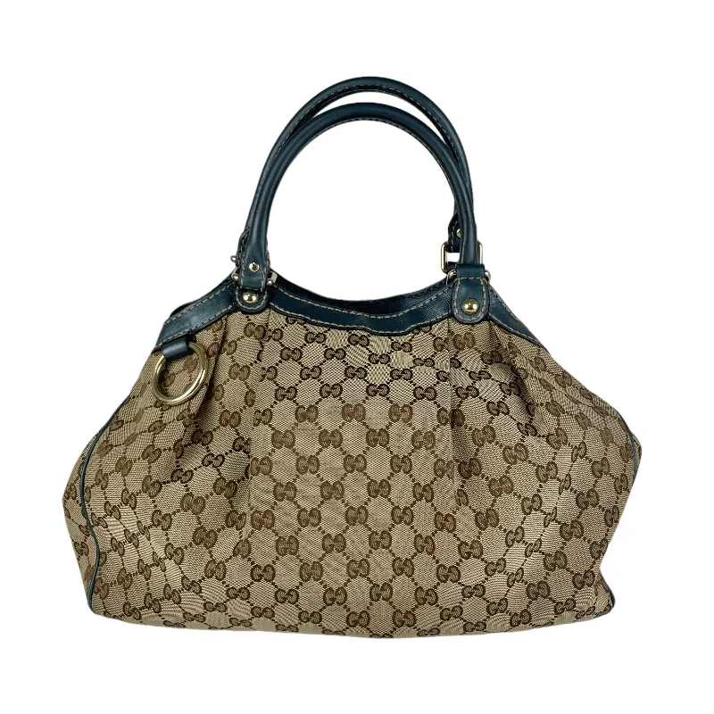 Women Gucci Sylvie bags featuring the signature web stripeWomen Gucci Sylvie bags featuring the signature web stripeGucci Blue Sukey Monogram Bag