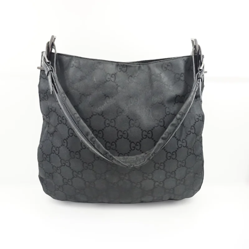 Women Gucci bags with a magnetic snap closure for easy accessWomen Gucci bags with a magnetic snap closure for easy accessGucci Nylon Skuldertaske