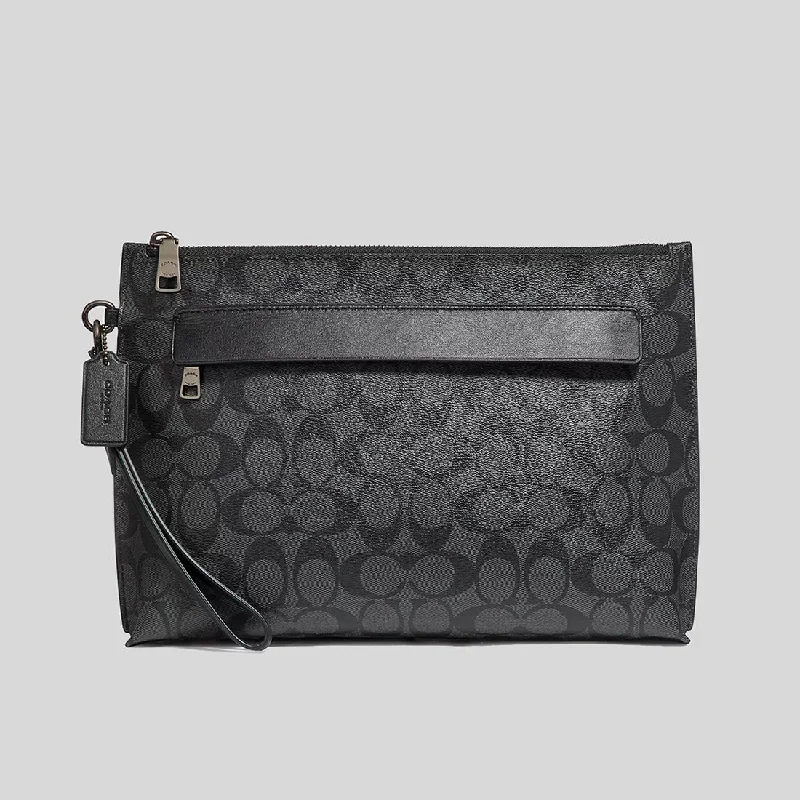 Coach tote bags with a water - resistant lining for practicalityCOACH Carryall Pouch In Signature Canvas Charcoal/Black 29508