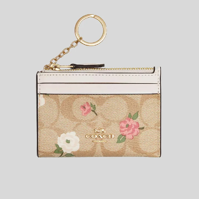 Coach crossbody bags with a detachable coin purse for added functionalityCOACH Mini Skinny Id Case In Signature Canvas With Floral Print CR972