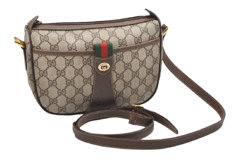 Women Gucci bags with a zippered interior pocketWomen Gucci bags with a zippered interior pocketAuthentic GUCCI Web Sherry Line Shoulder Bag GG PVC Leather Brown Junk 7020K