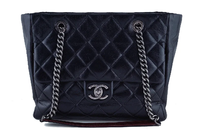 Chanel bags with the perfect balance of luxury and functionalityChanel Black Shopper Classic Flap Tote with Boy Chain Bag