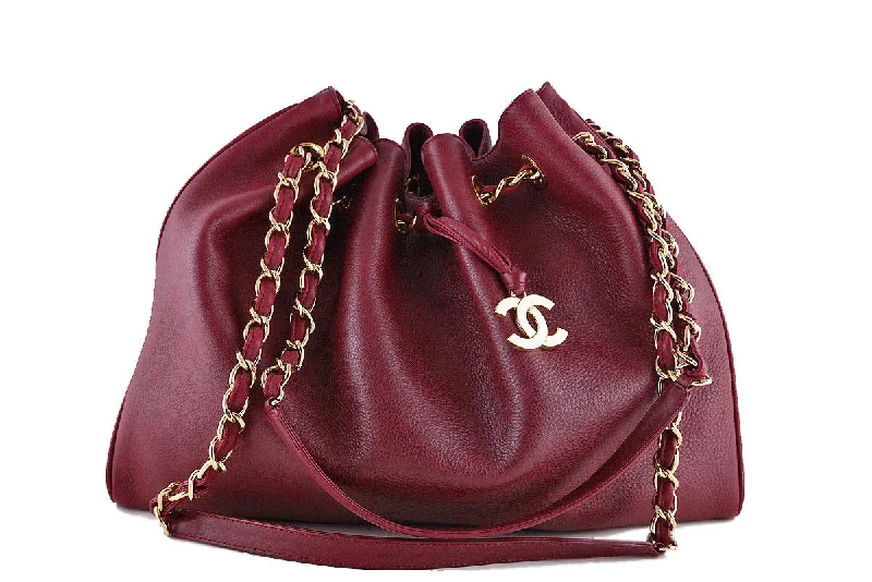 Chanel bags with gold, silver, and pearl accentsChanel Red Soft Textured CC Logo Drawstring Tote Shopper Bag