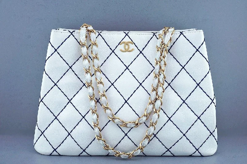 Chanel bags with leather and tweed combinationsChanel White Classic Contrast Navy Stitch Quilted Shopper Tote Bag