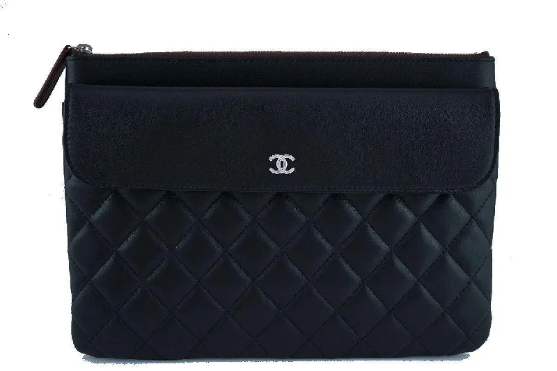 Chanel bags available in bold colors and patternsNWT 17S Chanel Black Classic Quilted O Case Flap Clutch Purse Bag