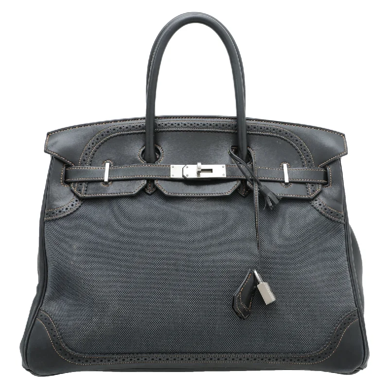 Hermes Birkin Bags in a Shiny Patent Leather Finish for a Glossy LookHermes Bicolor Ghillies Denim Ever Birkin 35 bag